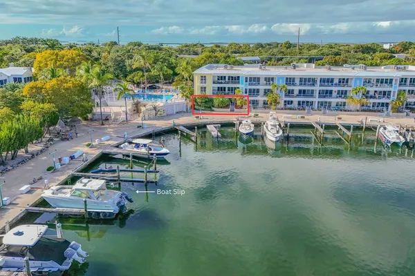 an aerial view of a house with outdoor space