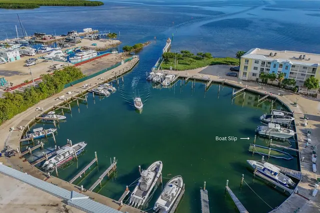 $2,250,000 | 97501 Overseas Highway, Unit 116 & 40' BOAT SLIP, Key Largo, FL 33037