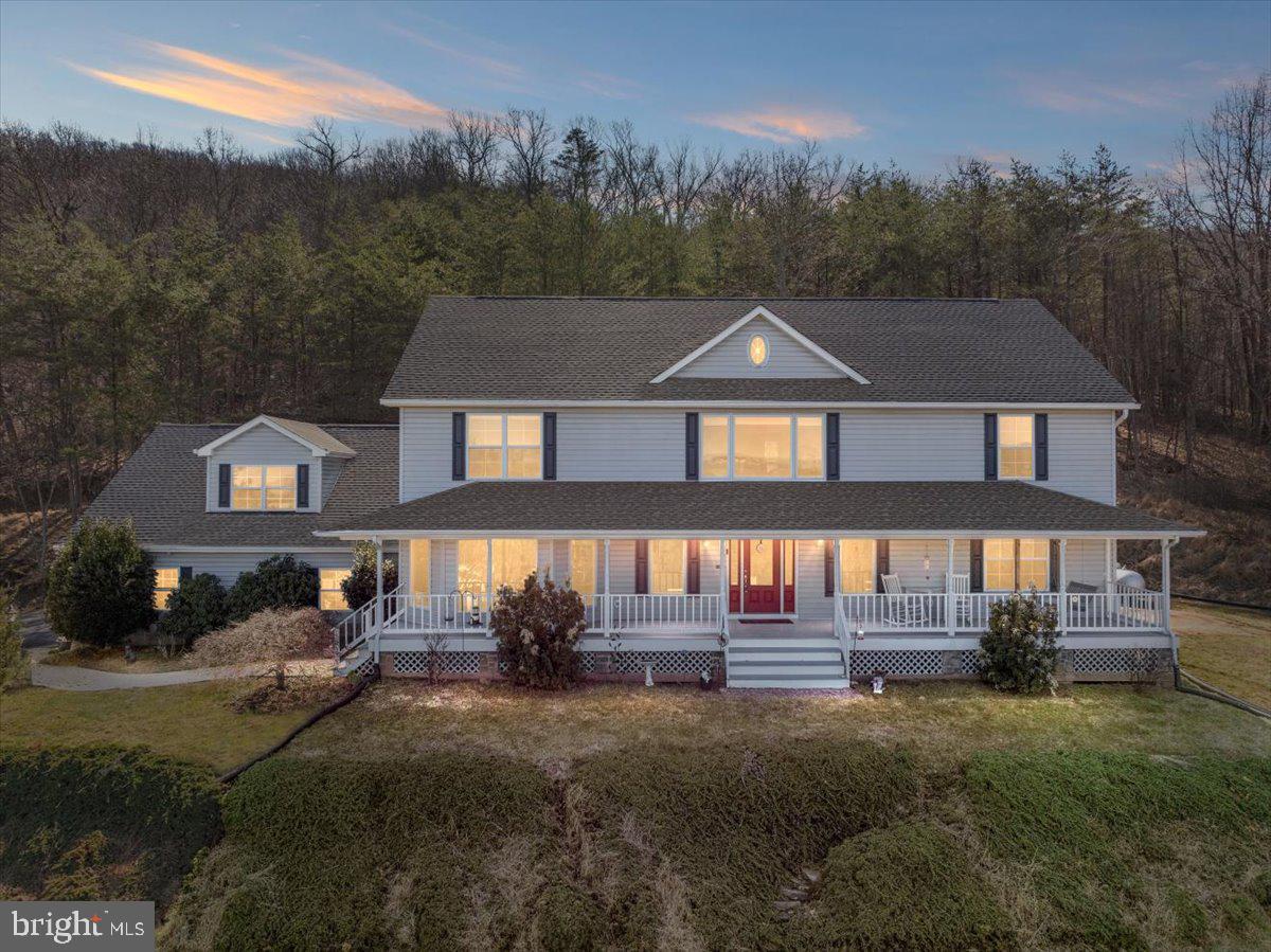 209 Park Ridge Court Front Royal, VA 22630 - Photo 1 of 60 a front view of a house with garden
