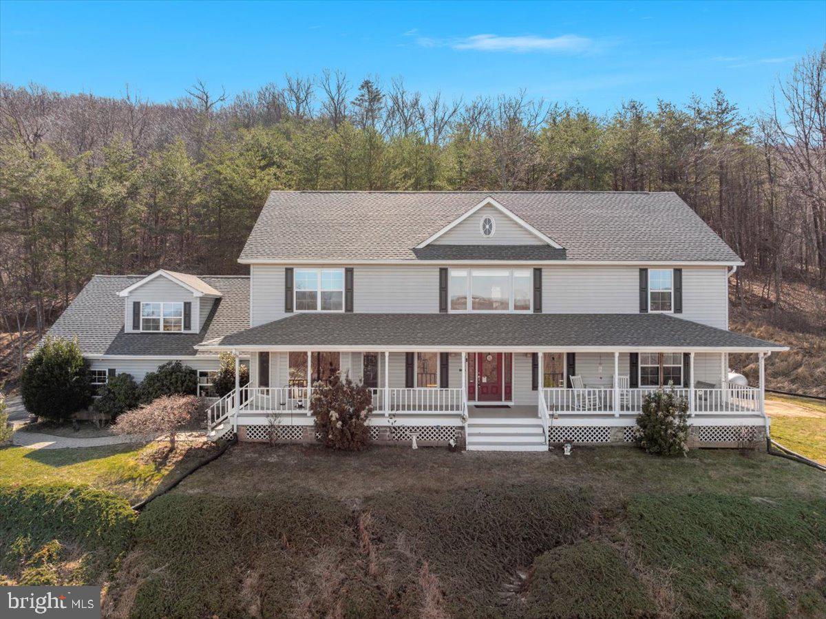 209 Park Ridge Court Front Royal, VA 22630 - Photo 2 of 60 a aerial view of a house next to a big yard and large trees