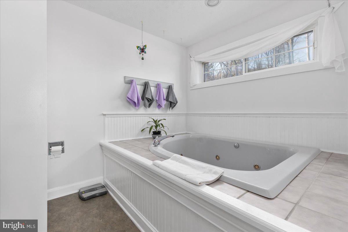 209 Park Ridge Court Front Royal, VA 22630 - Photo 36 of 60 a bathroom with a tub and sink