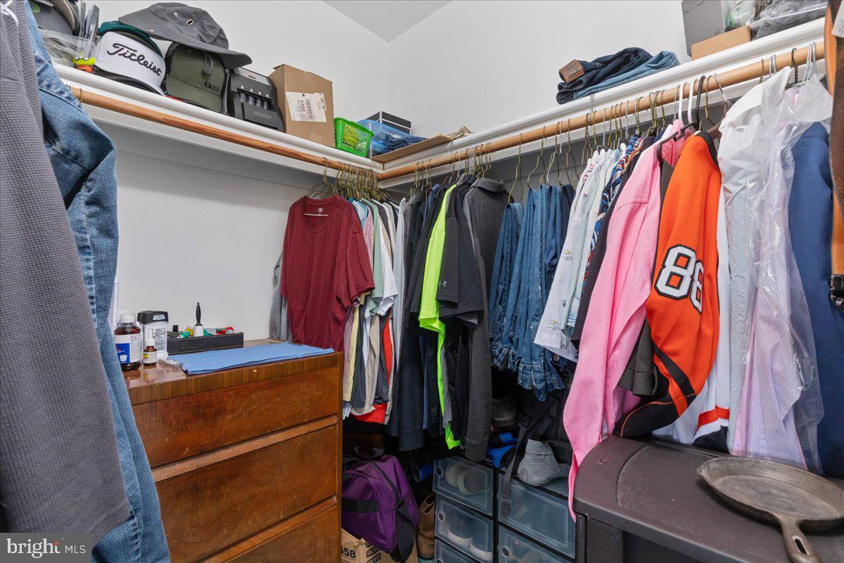 209 Park Ridge Court Front Royal, VA 22630 - Photo 40 of 60 a view of walk in closet with clothes and shoes