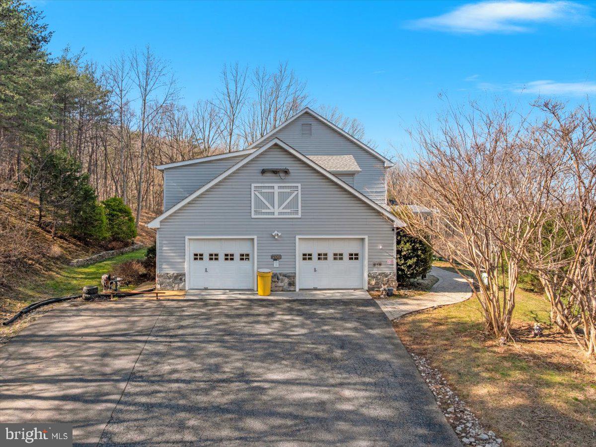 209 Park Ridge Court Front Royal, VA 22630 - Photo 49 of 60 a view of a house with a yard