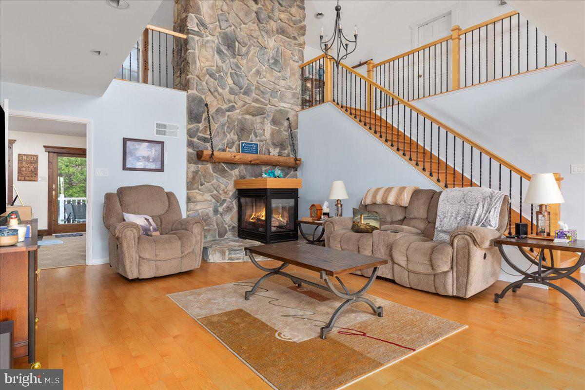 209 Park Ridge Court Front Royal, VA 22630 - Photo 6 of 60 a living room with furniture and a fireplace