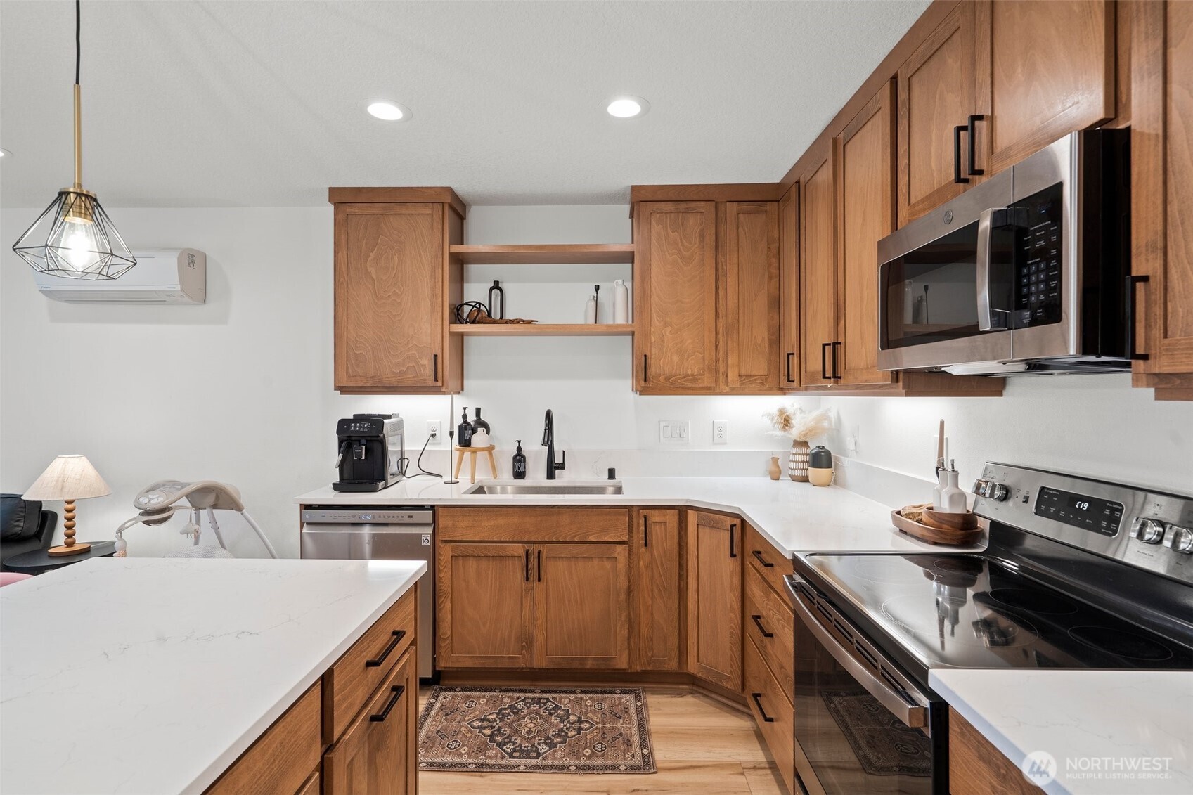 1013 Peach Road, Unit A & B Winlock, WA 98596 - Photo 11 of 30 a kitchen with a sink a stove and cabinets