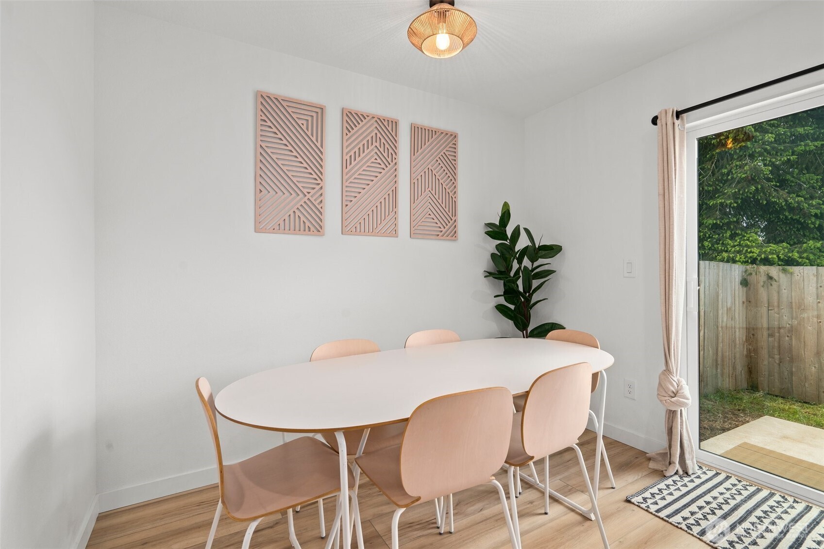 1013 Peach Road, Unit A & B Winlock, WA 98596 - Photo 13 of 30 a dining room with furniture and wooden floor