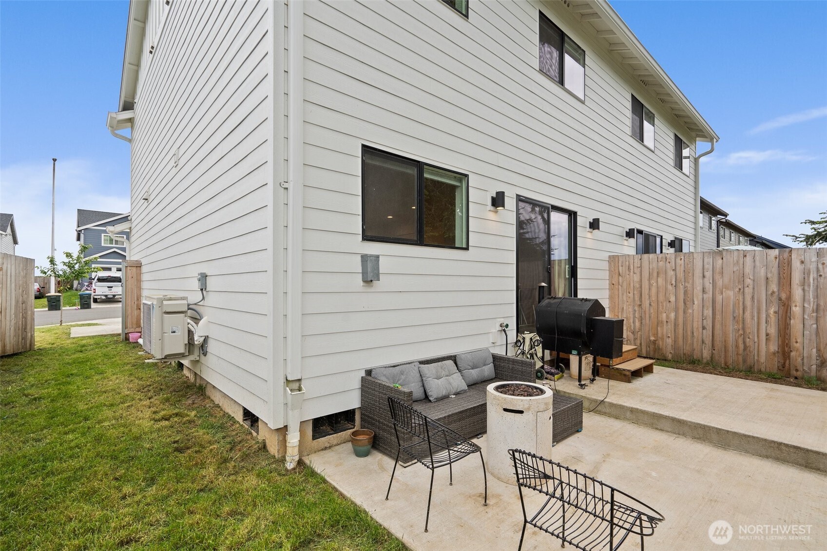 1013 Peach Road, Unit A & B Winlock, WA 98596 - Photo 26 of 30 a backyard of a house with table and chairs