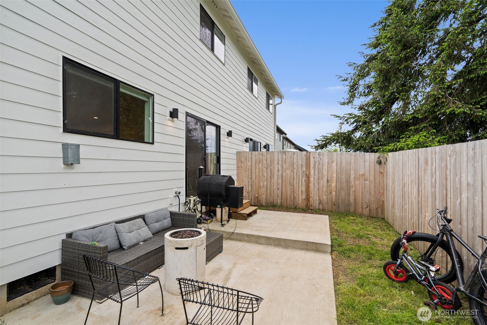 1013 Peach Road, Unit A & B Winlock, WA 98596 - Photo 27 of 30 a view of a chairs and table in backyard