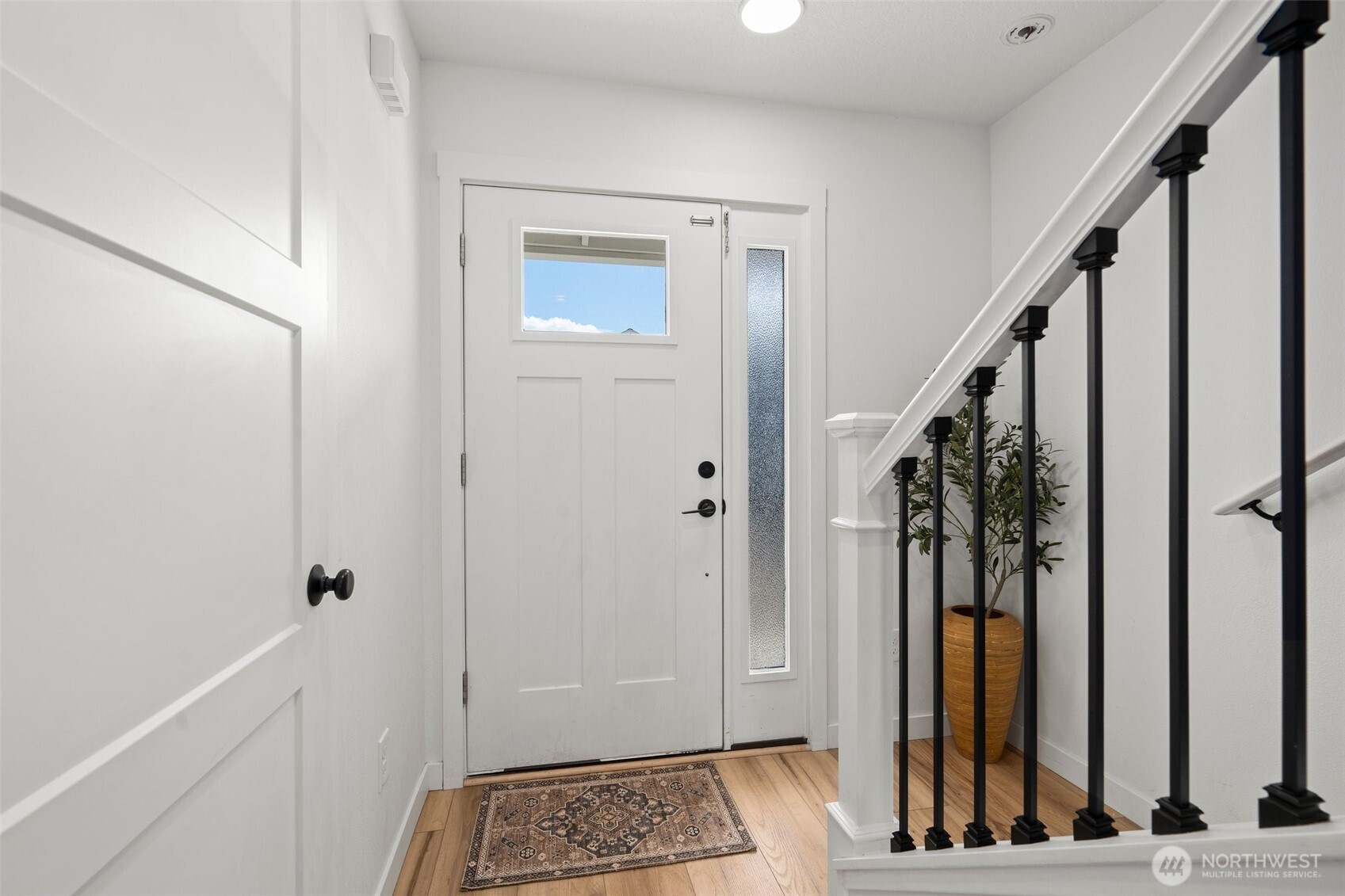1013 Peach Road, Unit A & B Winlock, WA 98596 - Photo 3 of 30 a view of an entryway with wooden floor and door