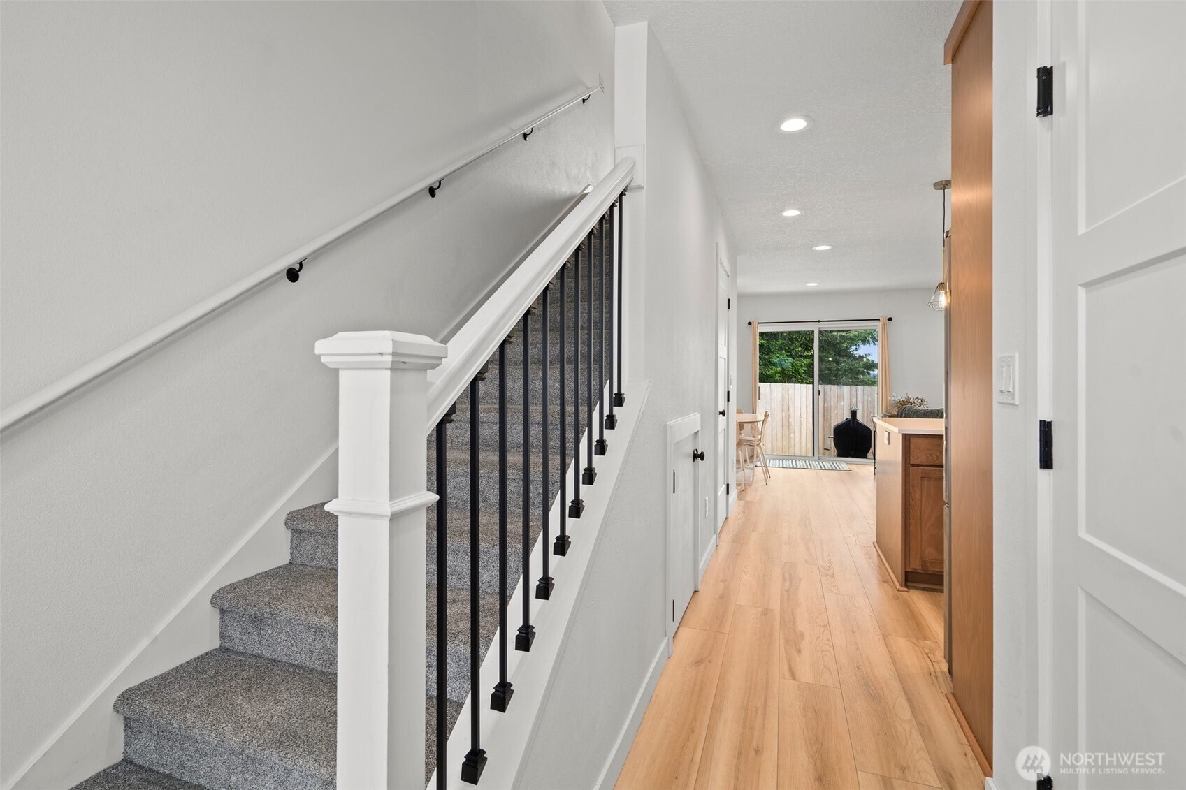 1013 Peach Road, Unit A & B Winlock, WA 98596 - Photo 4 of 30 a view of a hallway with wooden floor and staircase