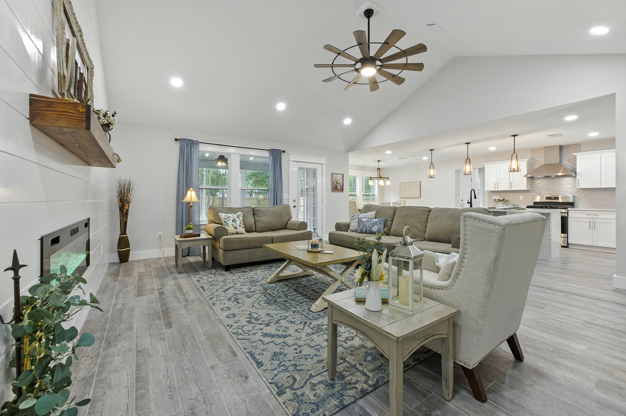 172 Frazier Road DeFuniak Springs, FL 32433 - Photo 14 of 78 a living room with furniture and a fireplace
