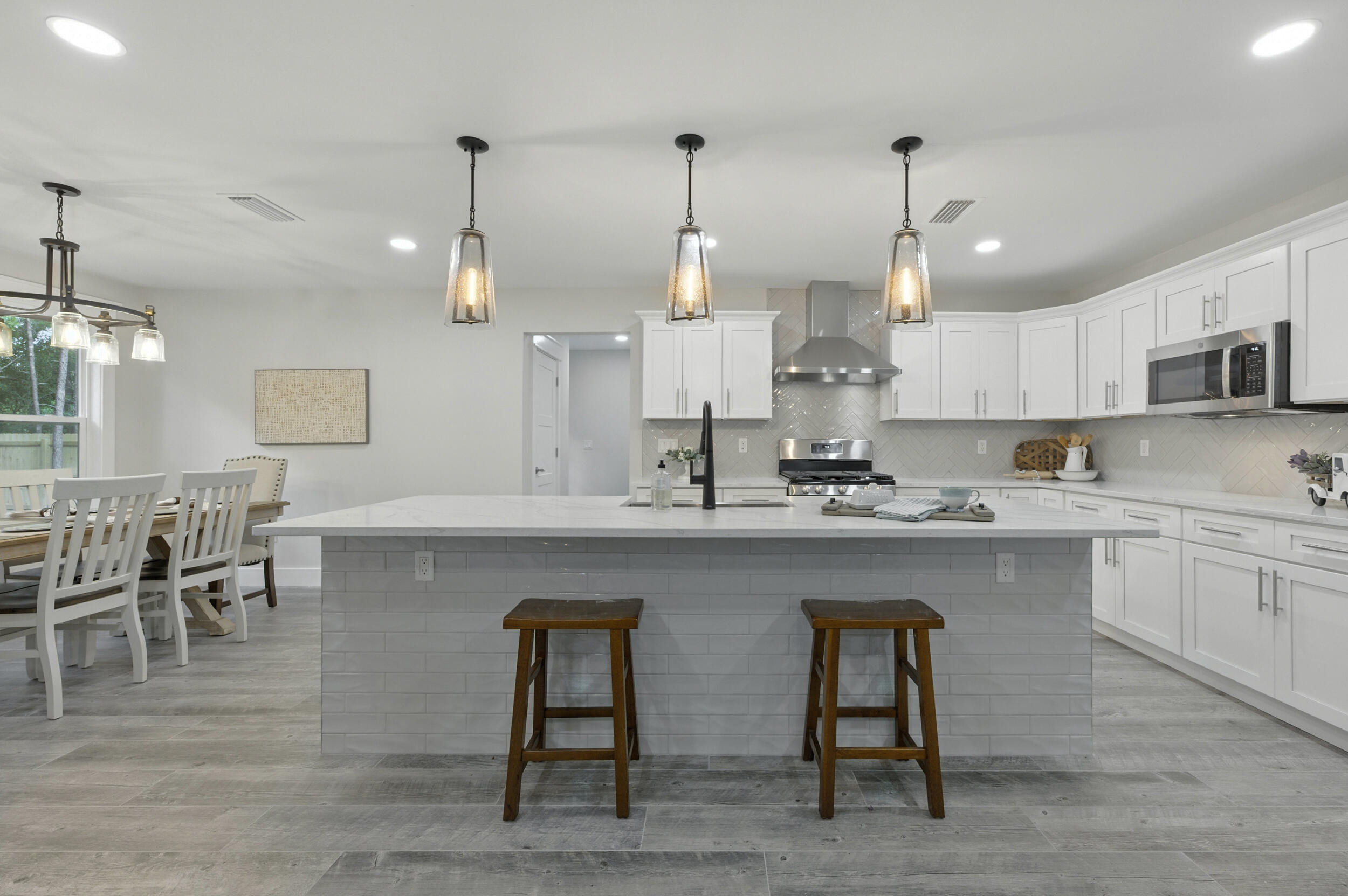 172 Frazier Road DeFuniak Springs, FL 32433 - Photo 19 of 78 a large kitchen with lots of counter space and a sink