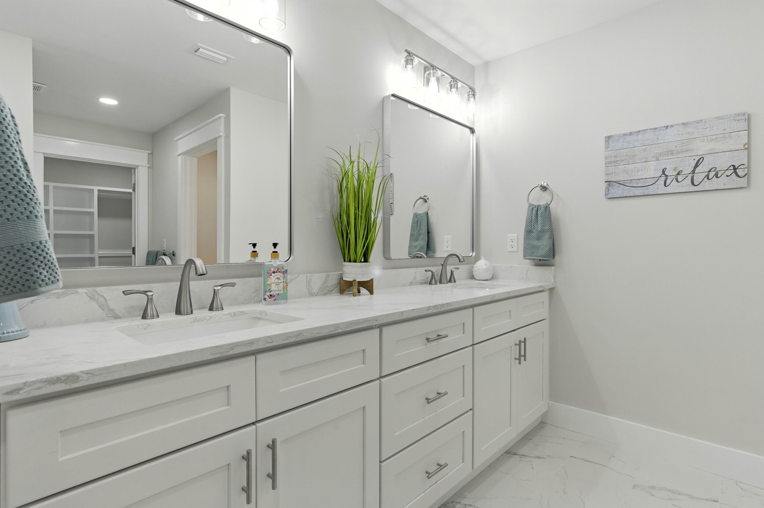 172 Frazier Road DeFuniak Springs, FL 32433 - Photo 36 of 78 a bathroom with double sink and a mirror