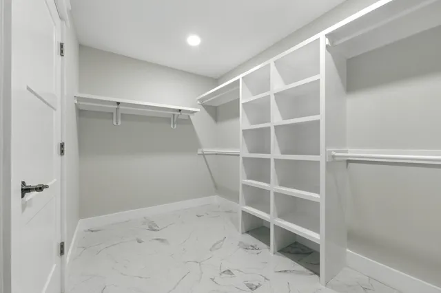 a view of a house with backyard and garden