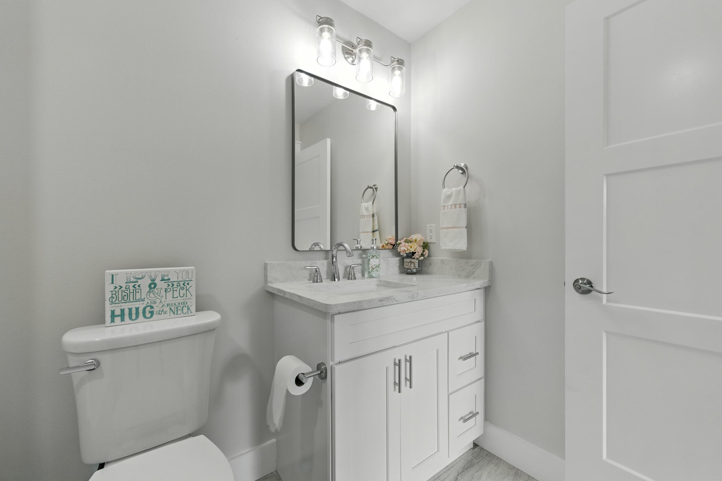 172 Frazier Road DeFuniak Springs, FL 32433 - Photo 56 of 78 a bathroom with a toilet sink and mirror