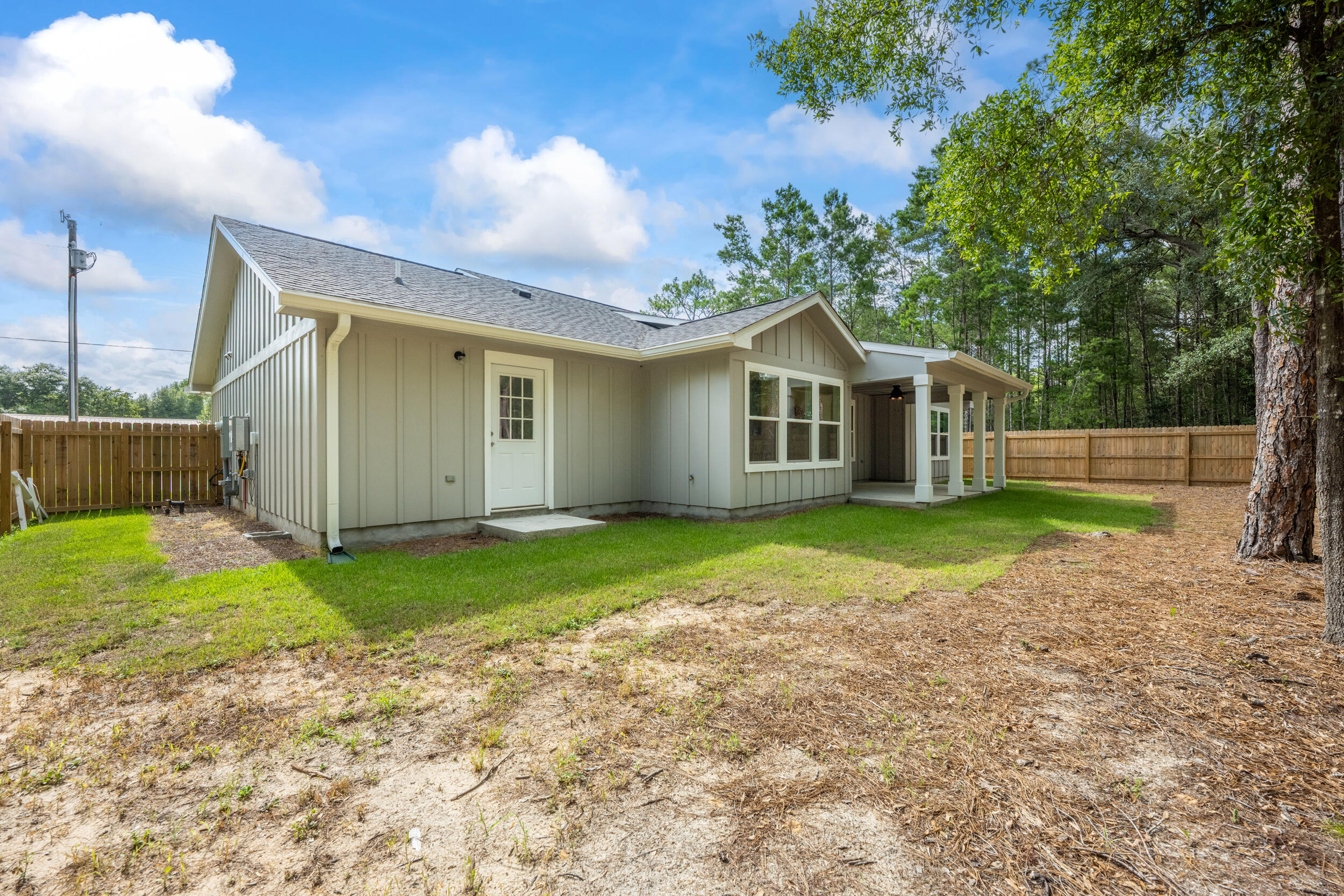 172 Frazier Road DeFuniak Springs, FL 32433 - Photo 70 of 78 a front view of house with yard and green space