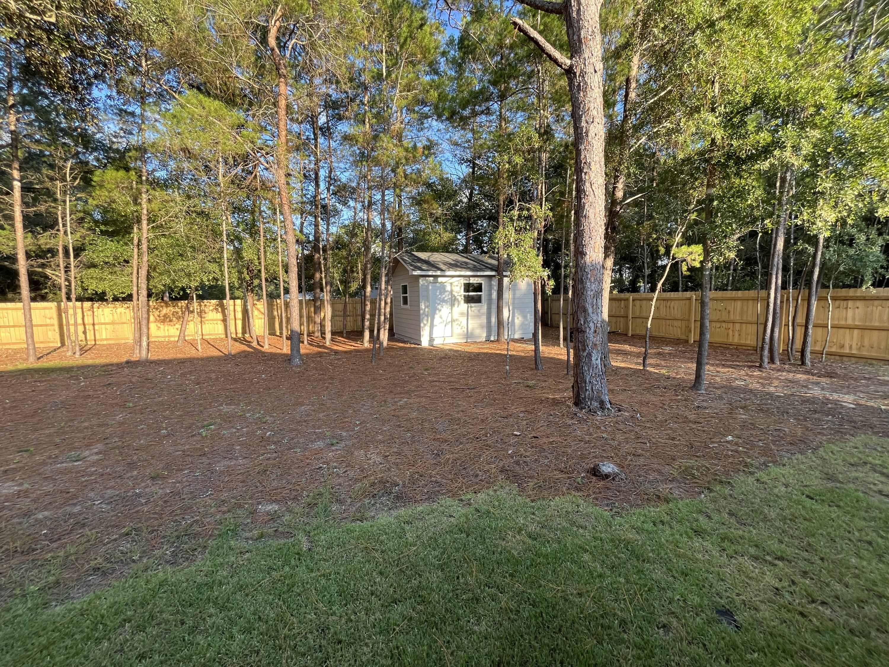 172 Frazier Road DeFuniak Springs, FL 32433 - Photo 78 of 78 a view of outdoor space with deck and tree