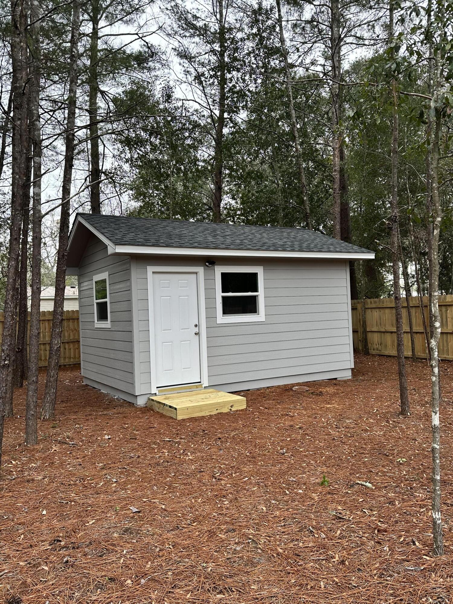 172 Frazier Road DeFuniak Springs, FL 32433 - Photo 79 of 79 a view of a house with a backyard