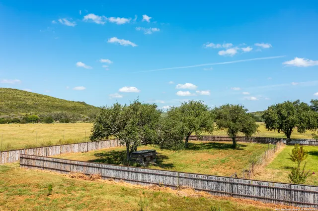 a view of a swimming pool with an outdoor space