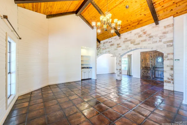 a view of a white house with a outdoor space