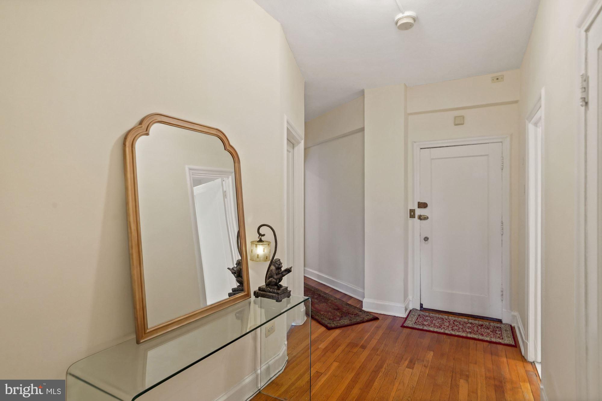 2032 Belmont Road Northwest, Unit 407 Washington, DC 20009 - Photo 10 of 19 Spacious hall entrance allows space for small desk