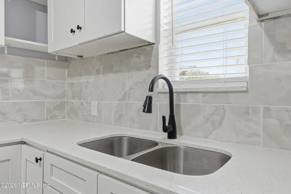 a close view of a sink and tap