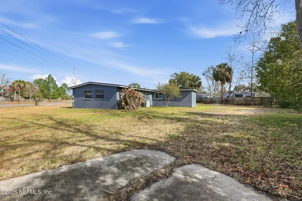 a view of a yard with an outdoor space