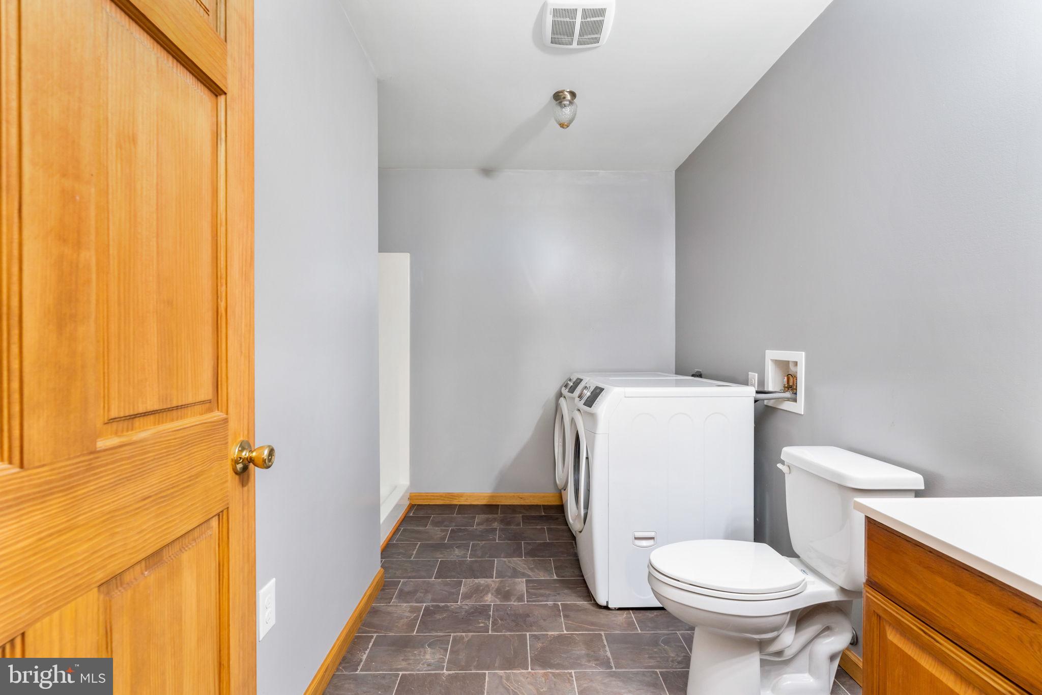 330 Long Point Road Hague, VA 22469 - Photo 24 of 41 second bath with laundry