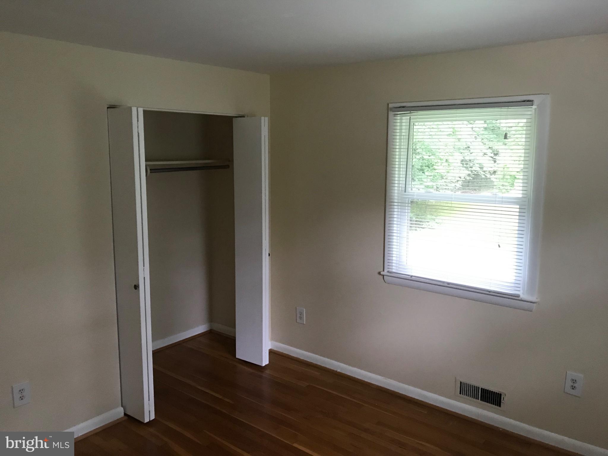 113 Kingsley Road Southwest Vienna, VA 22180 - Photo 16 of 40 Bright and airy room with closet space.