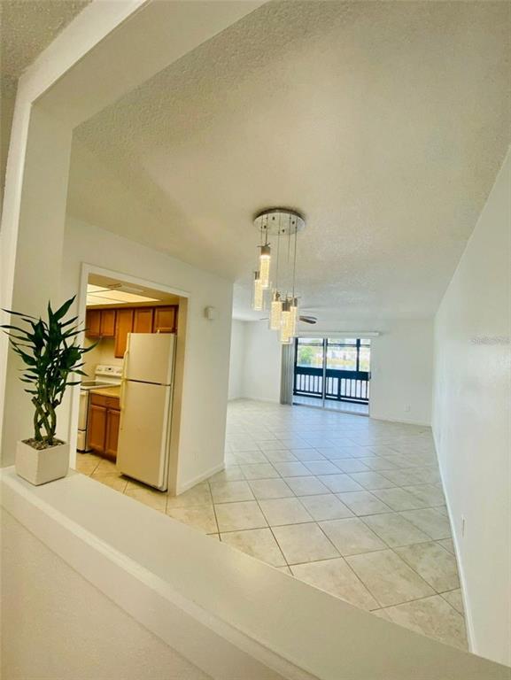 633 North Keene Road, Unit C Clearwater, FL 33755 - Photo 3 of 20 a view of a storage & utility room with washer and dryer