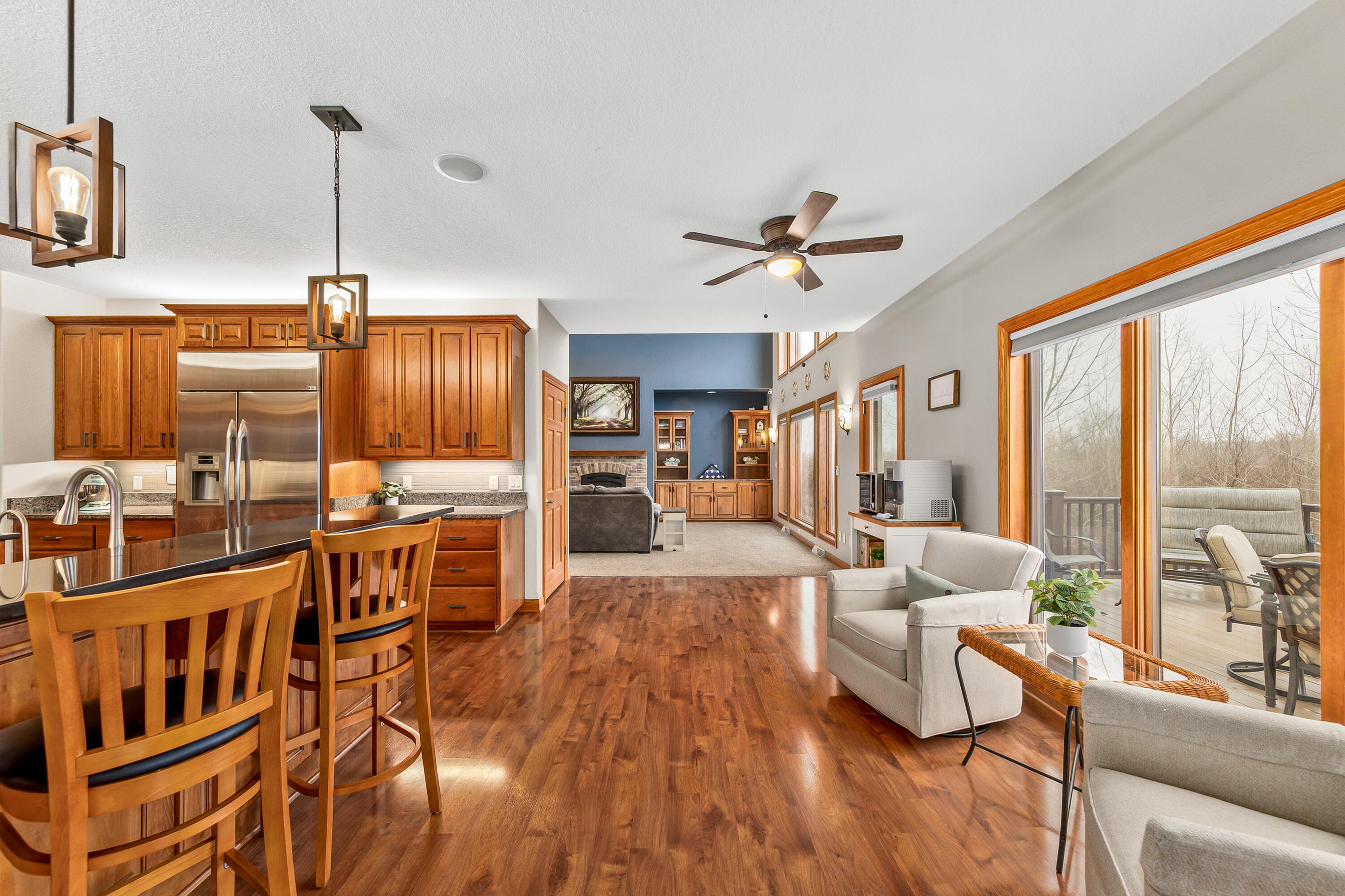 S62W28195 Ridge Valley Road Genesee, WI 53189 - Photo 16 of 68 Access to the maintenance-free deck between the Great Room & Kitchen