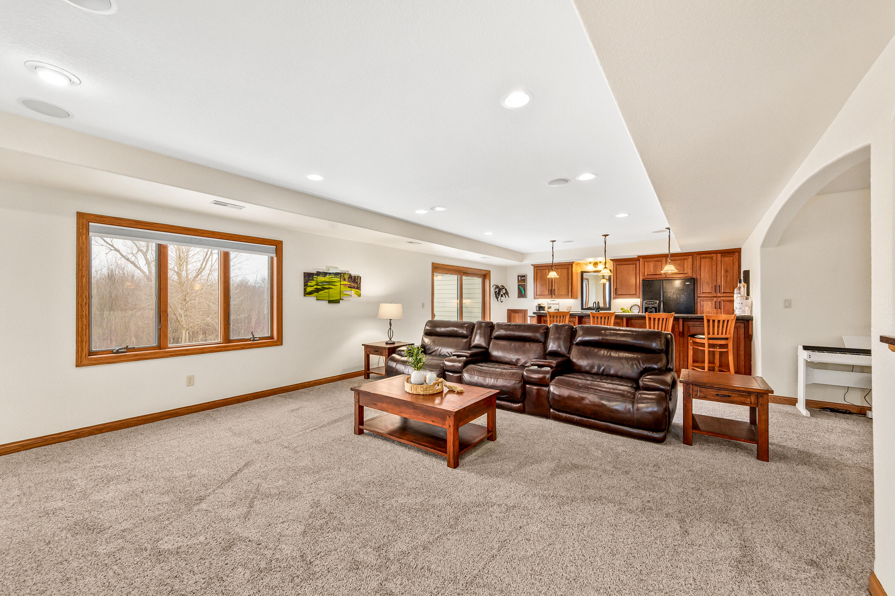 S62W28195 Ridge Valley Road Genesee, WI 53189 - Photo 46 of 68 Sliding doors out to the spacious patio so your gatherings can easily flow from inside to the beautiful outdoors