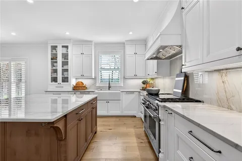 a bathroom with a sink a vanity and shower