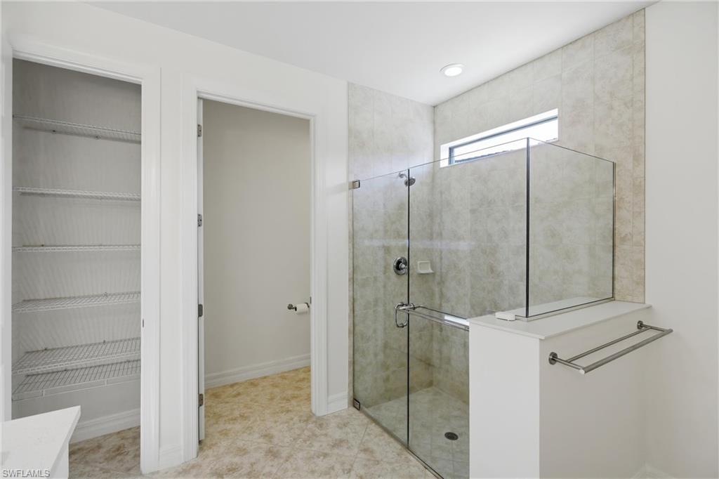 11041 Castlereagh Street Fort Myers, FL 33913 - Photo 14 of 49 a bathroom with a shower and a sink