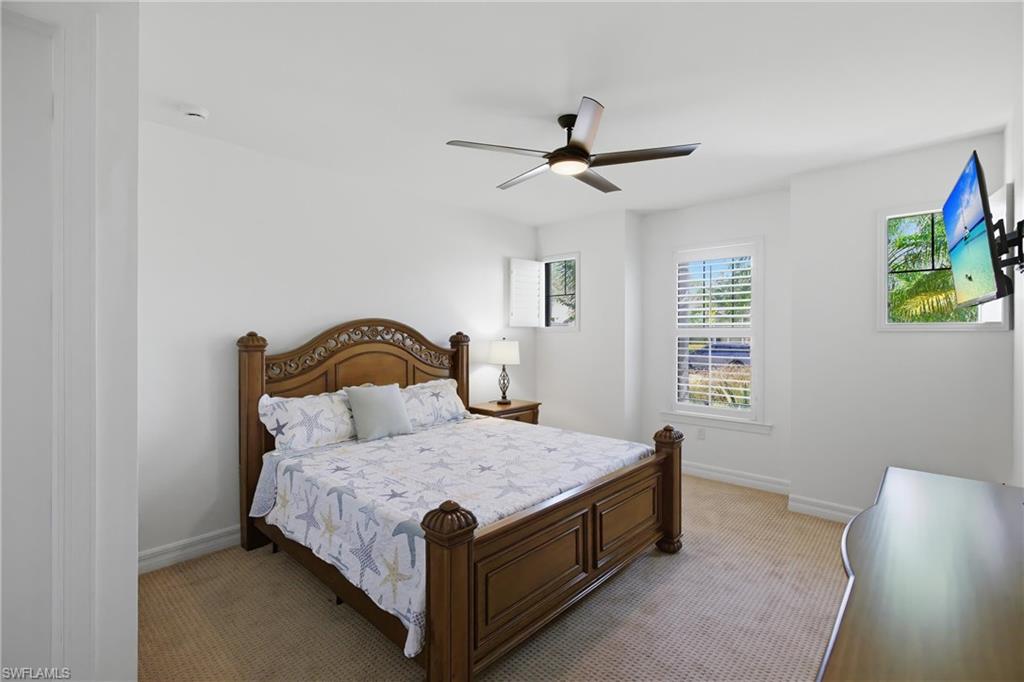 11041 Castlereagh Street Fort Myers, FL 33913 - Photo 16 of 49 a bedroom with a bed and a window