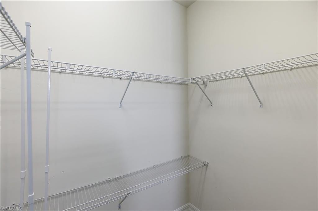 11041 Castlereagh Street Fort Myers, FL 33913 - Photo 22 of 49 a view of a room with racks on the wall