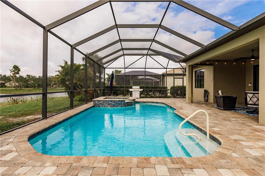 11041 Castlereagh Street Fort Myers, FL 33913 - Photo 28 of 49 a view of a swimming pool with a patio