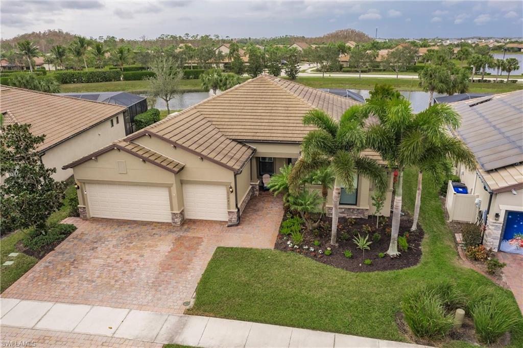11041 Castlereagh Street Fort Myers, FL 33913 - Photo 37 of 49 an aerial view of house with yard and lake view in back