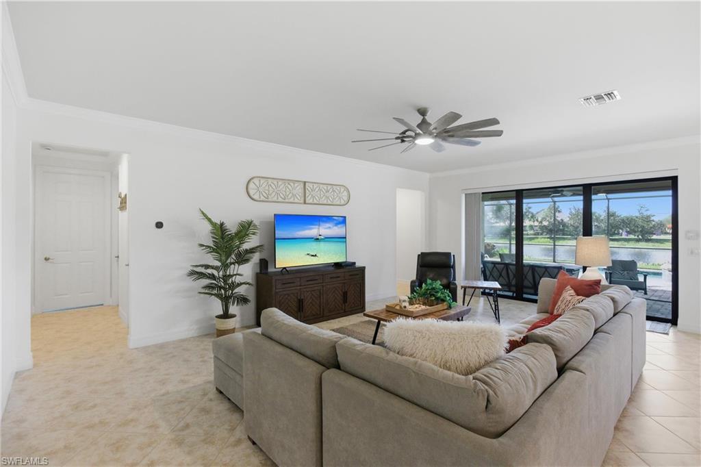 11041 Castlereagh Street Fort Myers, FL 33913 - Photo 10 of 49 a living room with furniture and a large window