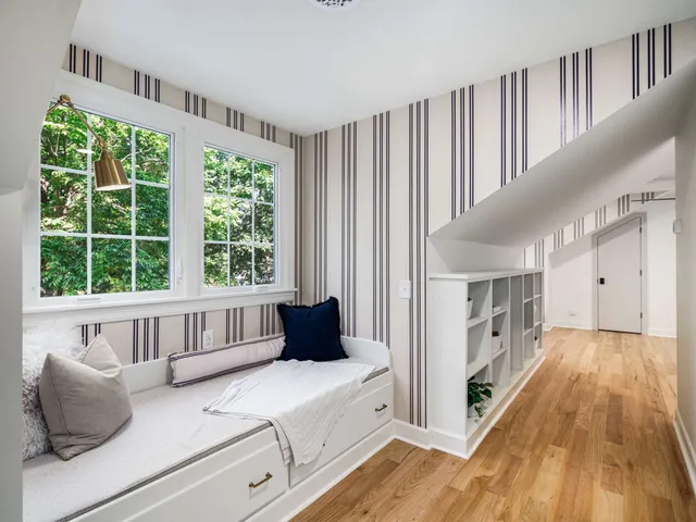 a front view of house with yard and outdoor seating