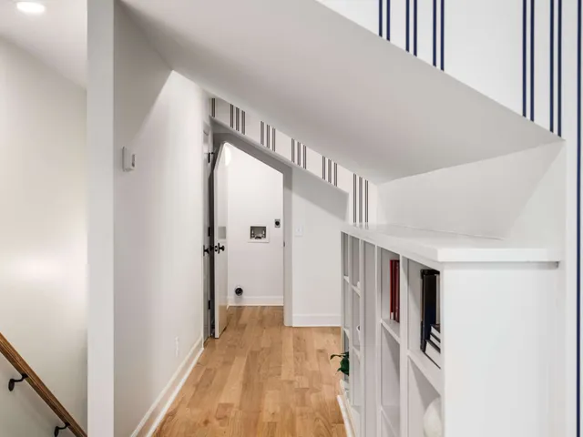 a view of a house with swimming pool and sitting area