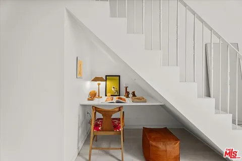 a room with furniture and window