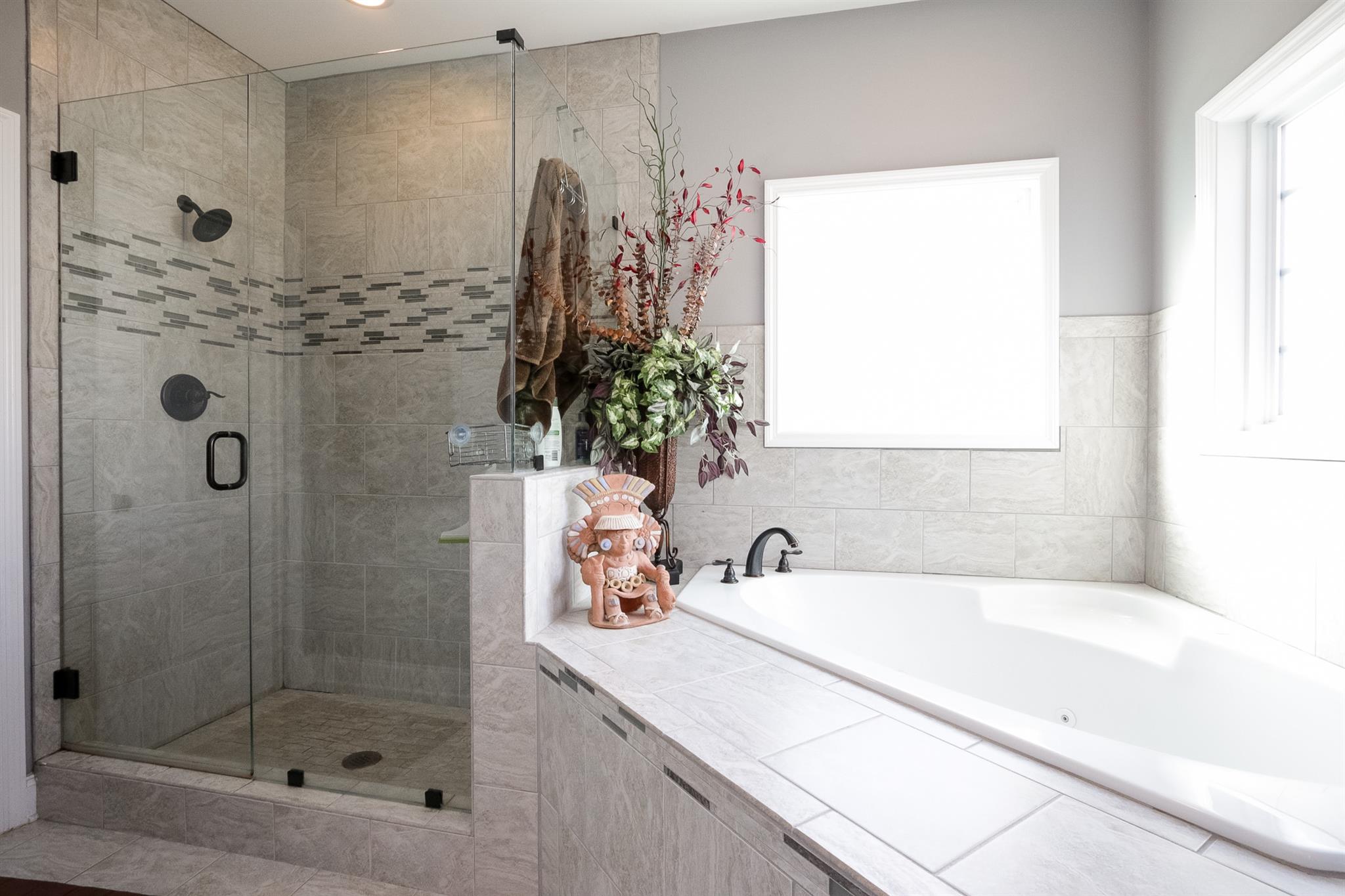 1069 Northern Road Mount Juliet, TN 37122 - Photo 14 of 30 a bathroom with a tub sink and shower