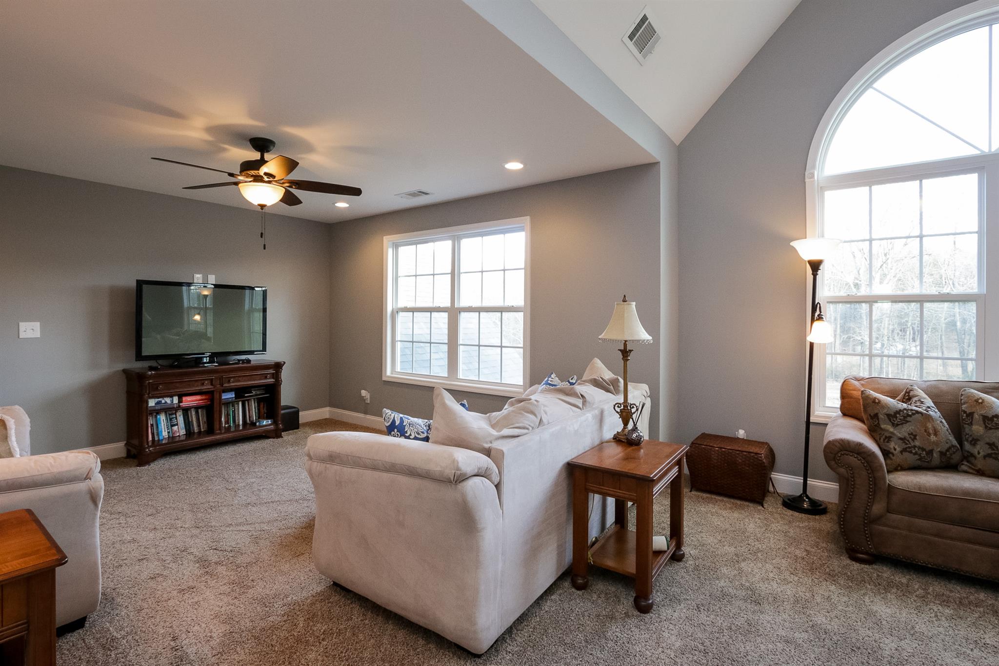 1069 Northern Road Mount Juliet, TN 37122 - Photo 15 of 30 a living room with furniture a flat screen tv and a large window