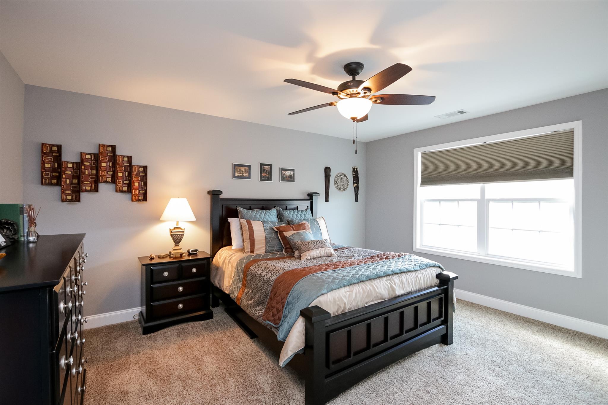 1069 Northern Road Mount Juliet, TN 37122 - Photo 16 of 30 a bedroom with a bed and a chandelier