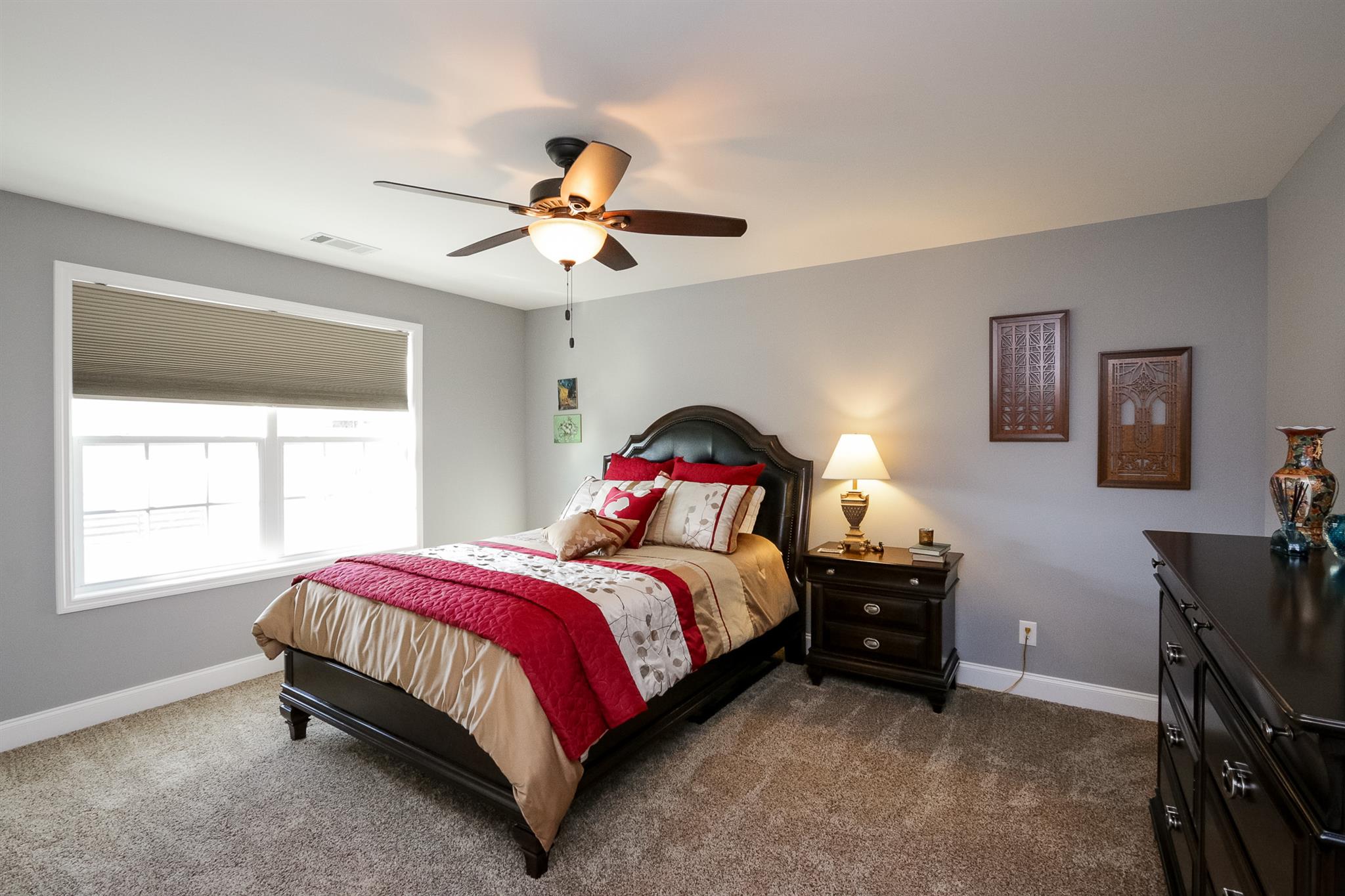 1069 Northern Road Mount Juliet, TN 37122 - Photo 17 of 30 a bedroom with a bed and a chandelier