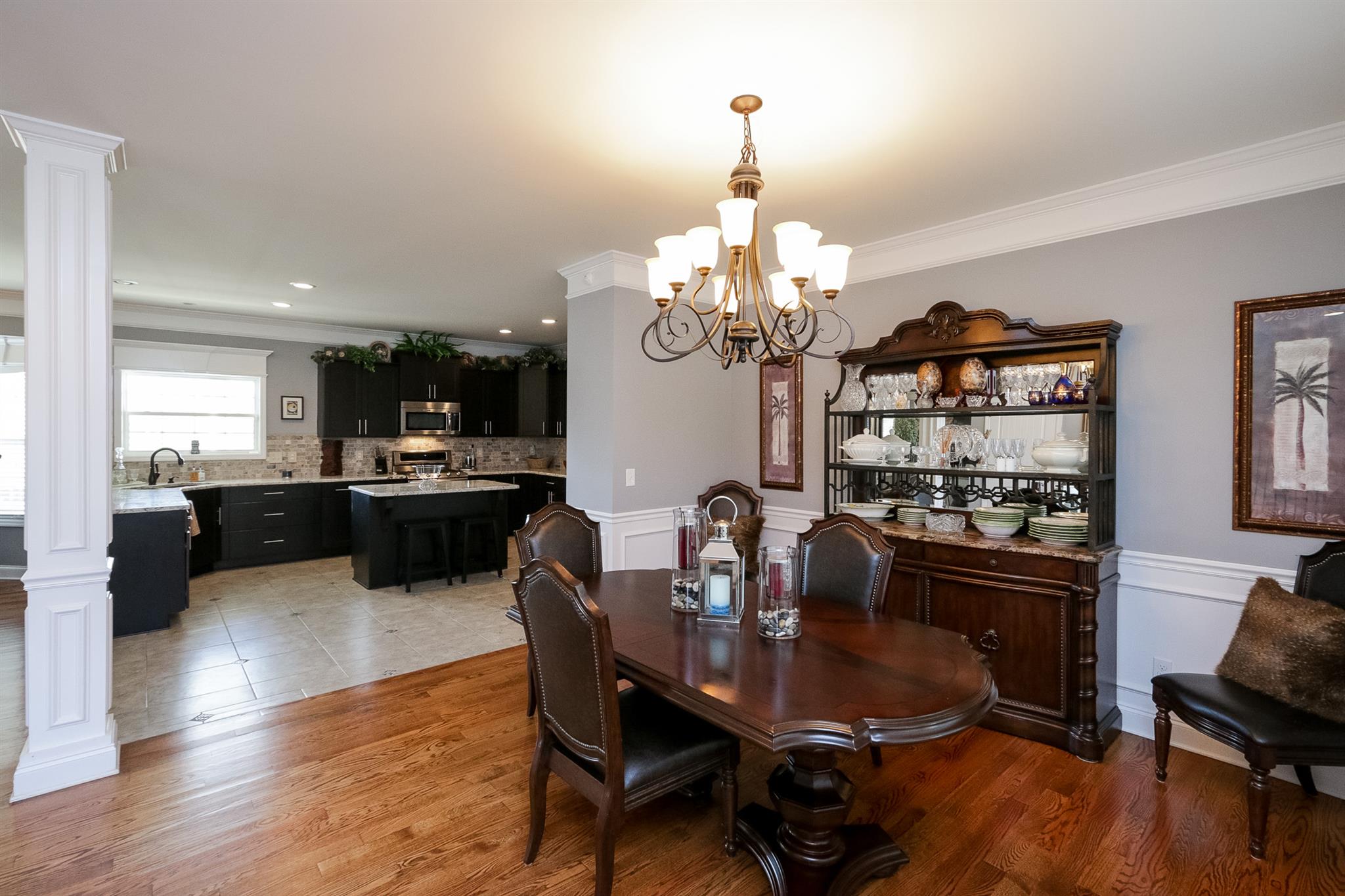 1069 Northern Road Mount Juliet, TN 37122 - Photo 5 of 30 a view of a dining room with furniture wooden floor and chandelier