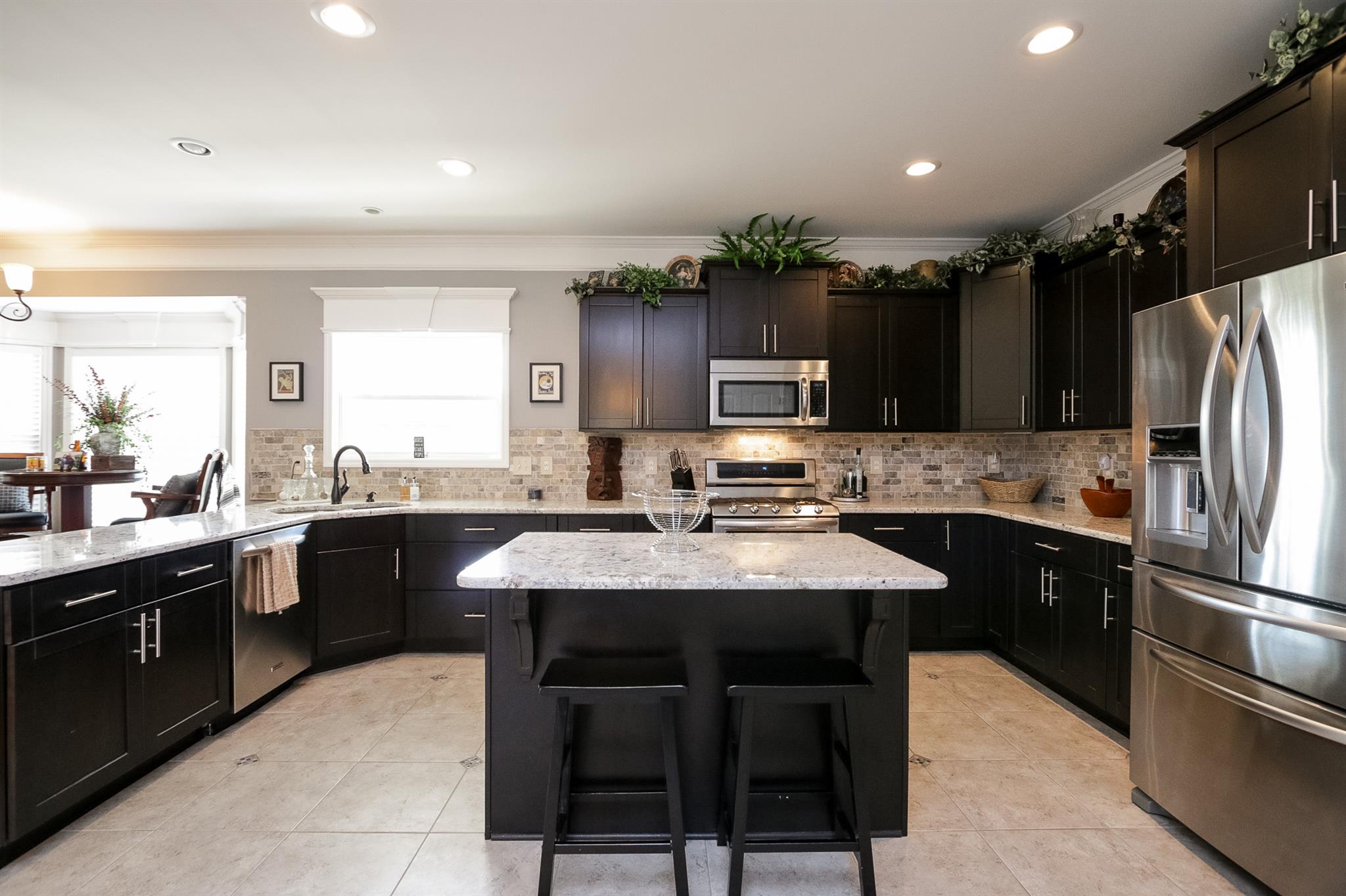 1069 Northern Road Mount Juliet, TN 37122 - Photo 7 of 30 a kitchen with stainless steel appliances granite countertop a refrigerator a sink dishwasher a stove and a refrigerator