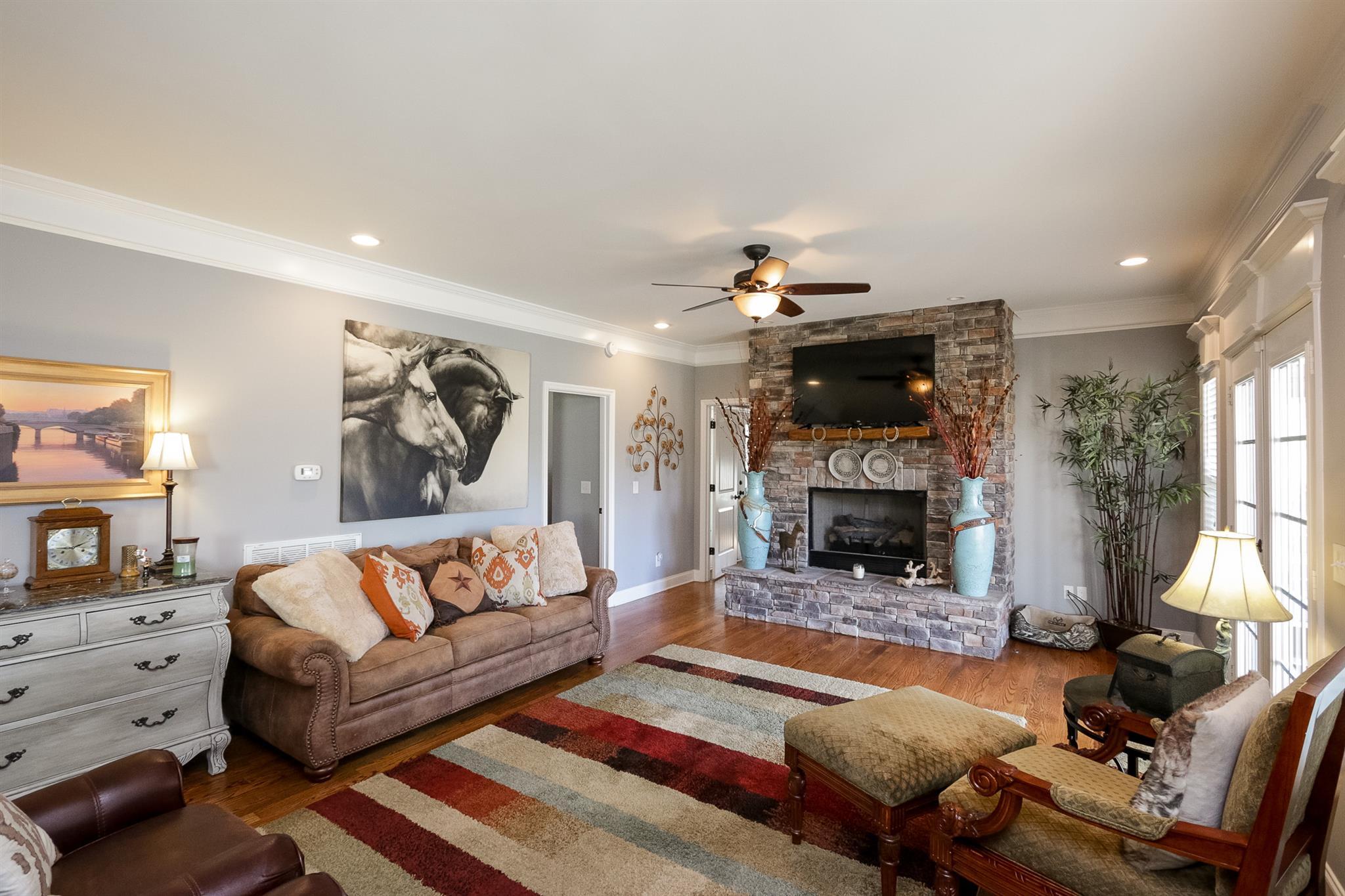 1069 Northern Road Mount Juliet, TN 37122 - Photo 9 of 30 a living room with furniture and a fireplace