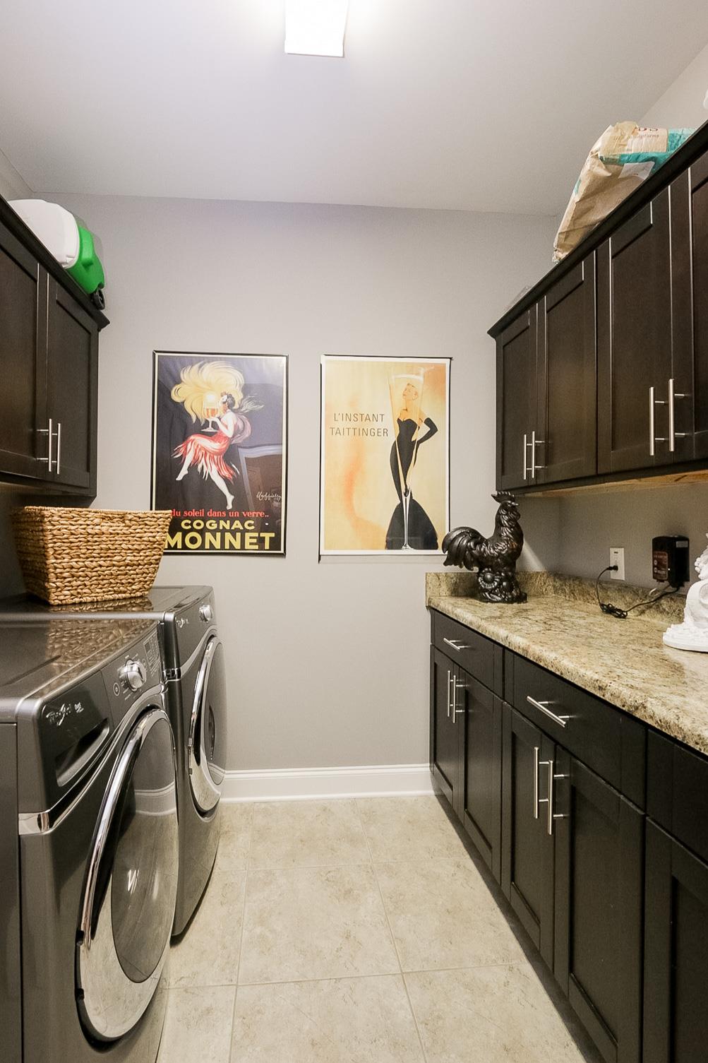 1069 Northern Road Mount Juliet, TN 37122 - Photo 10 of 30 a kitchen with stainless steel appliances granite countertop a sink and a stove top oven